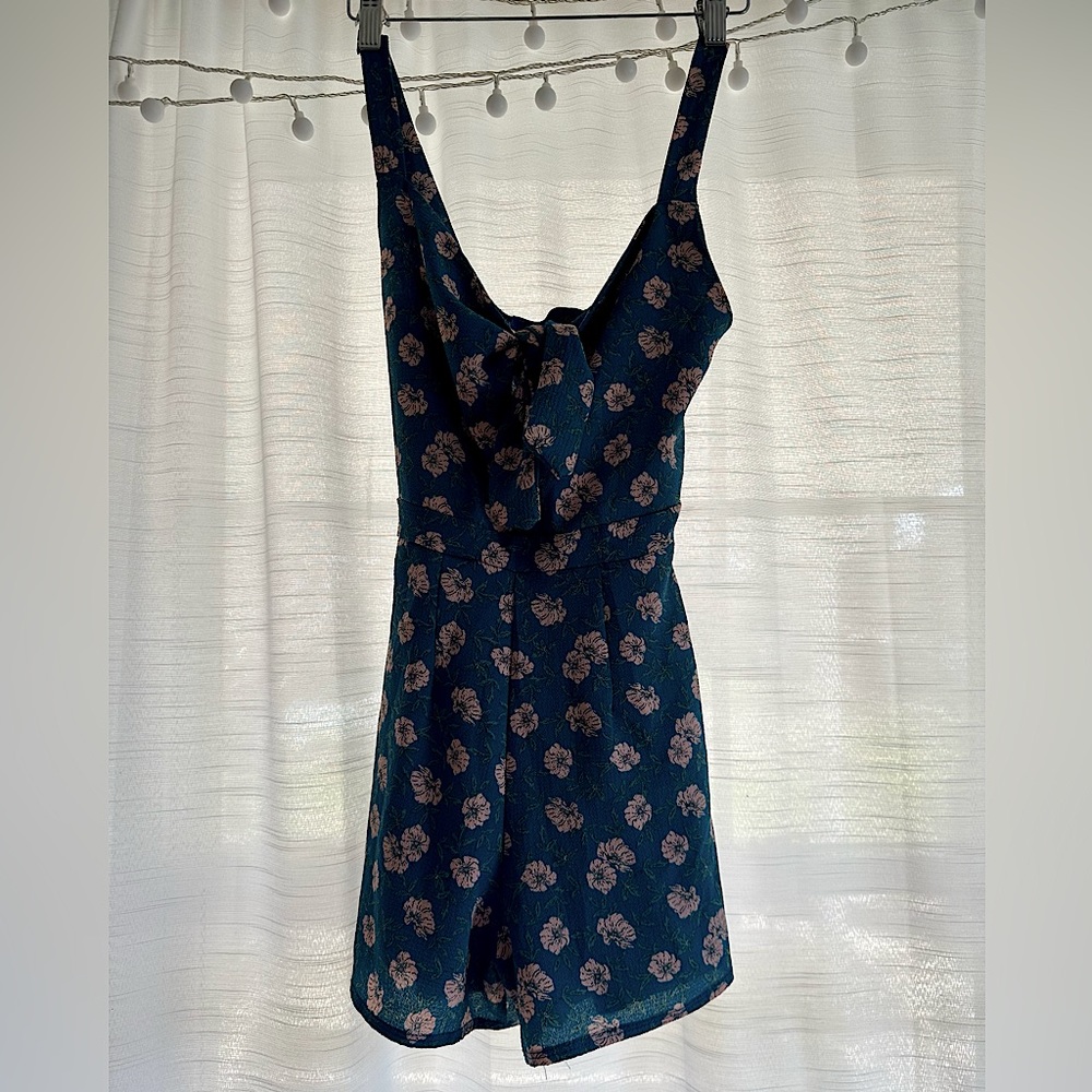 Floral Romper With adjustable bow in the front
